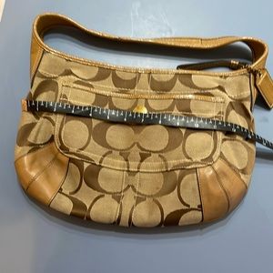 Coach medium sized under arm bag. Beige